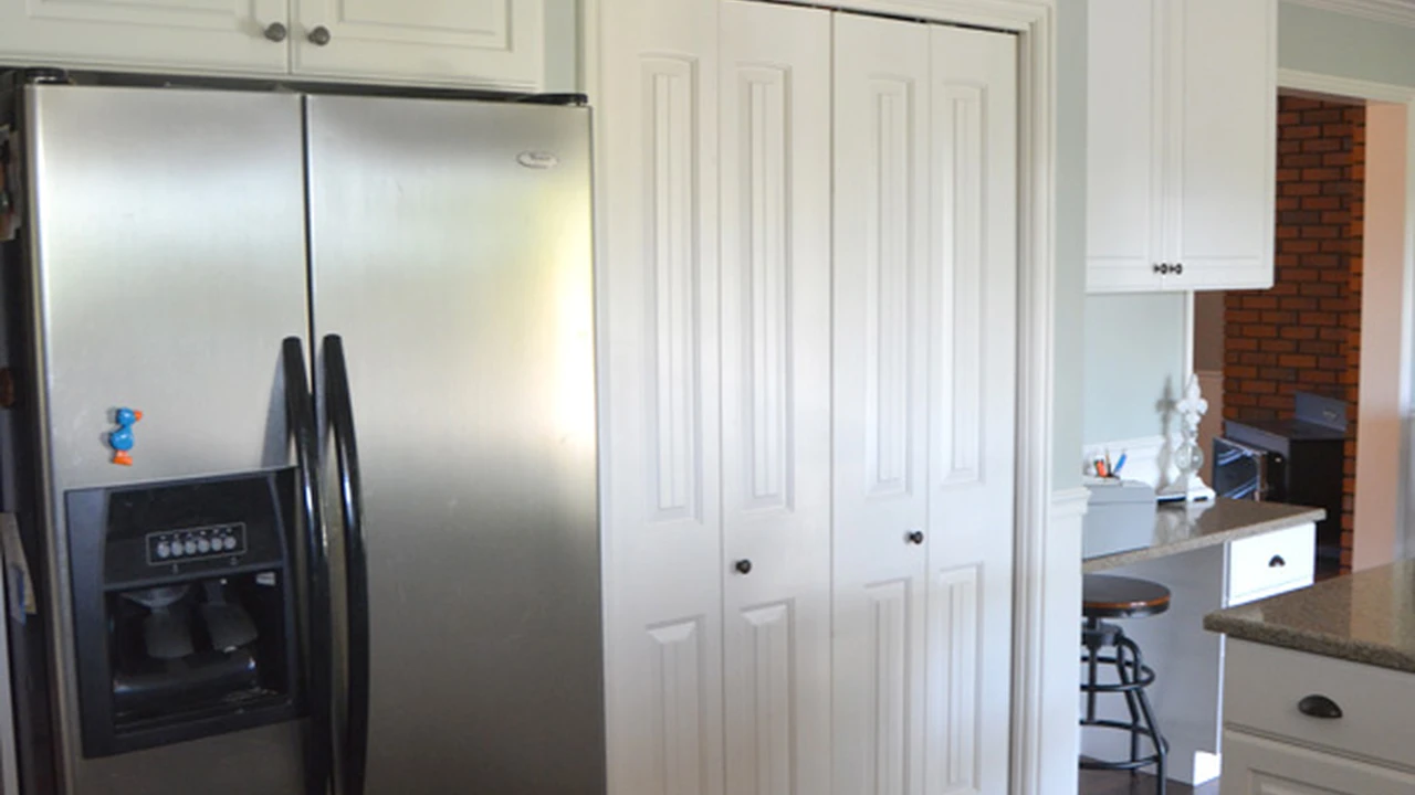 Two mint chocolate milkshakes with whipped cream and green sprinkles.