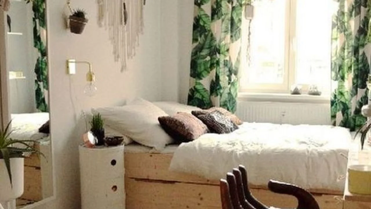 Close up on a plate of mashed potatoes, topped with baked pork chops with cream of mushroom soup, and a side of green beans.